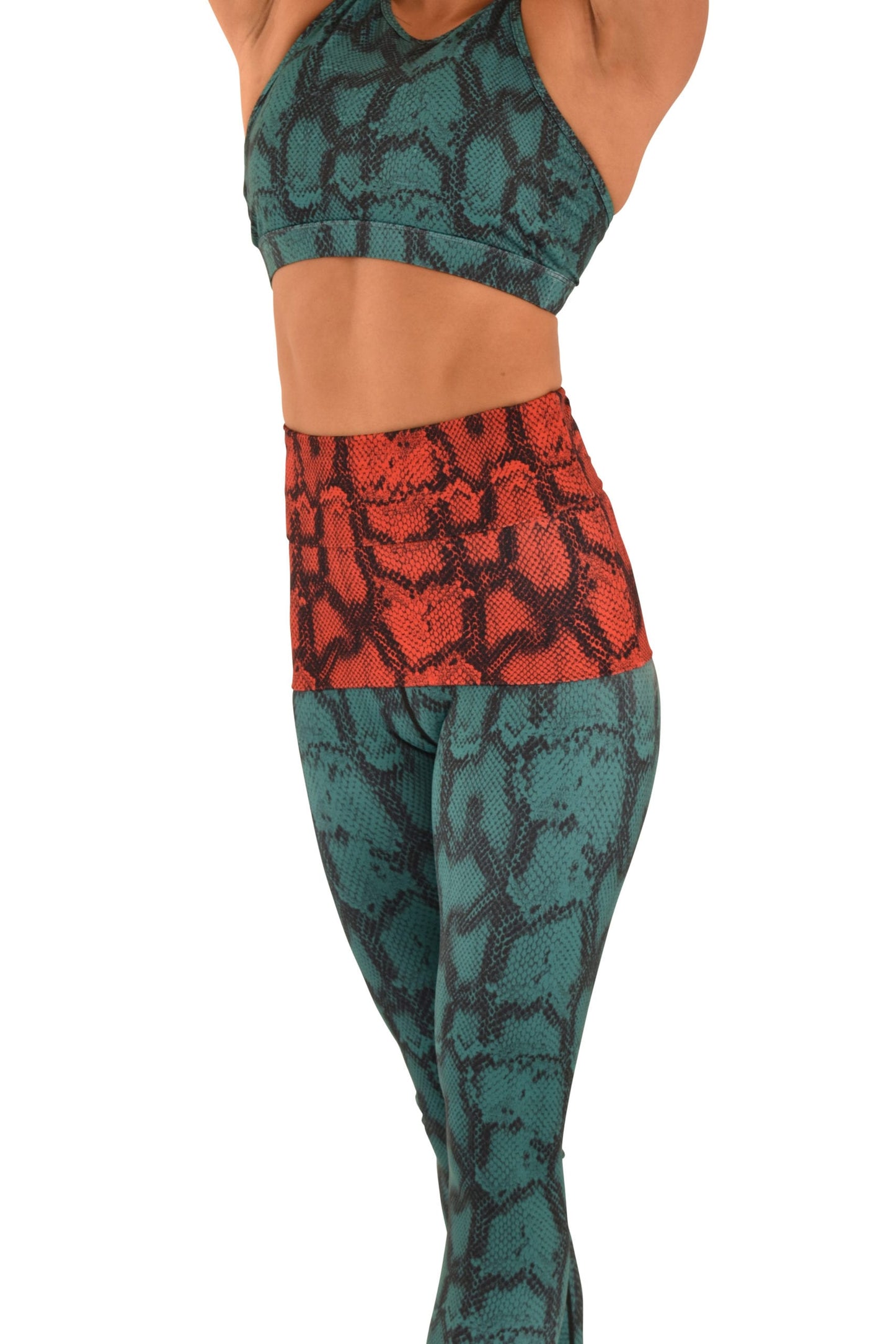 OFF THE POLE RYGGVARMER- SNAKEPRINT ORANGE